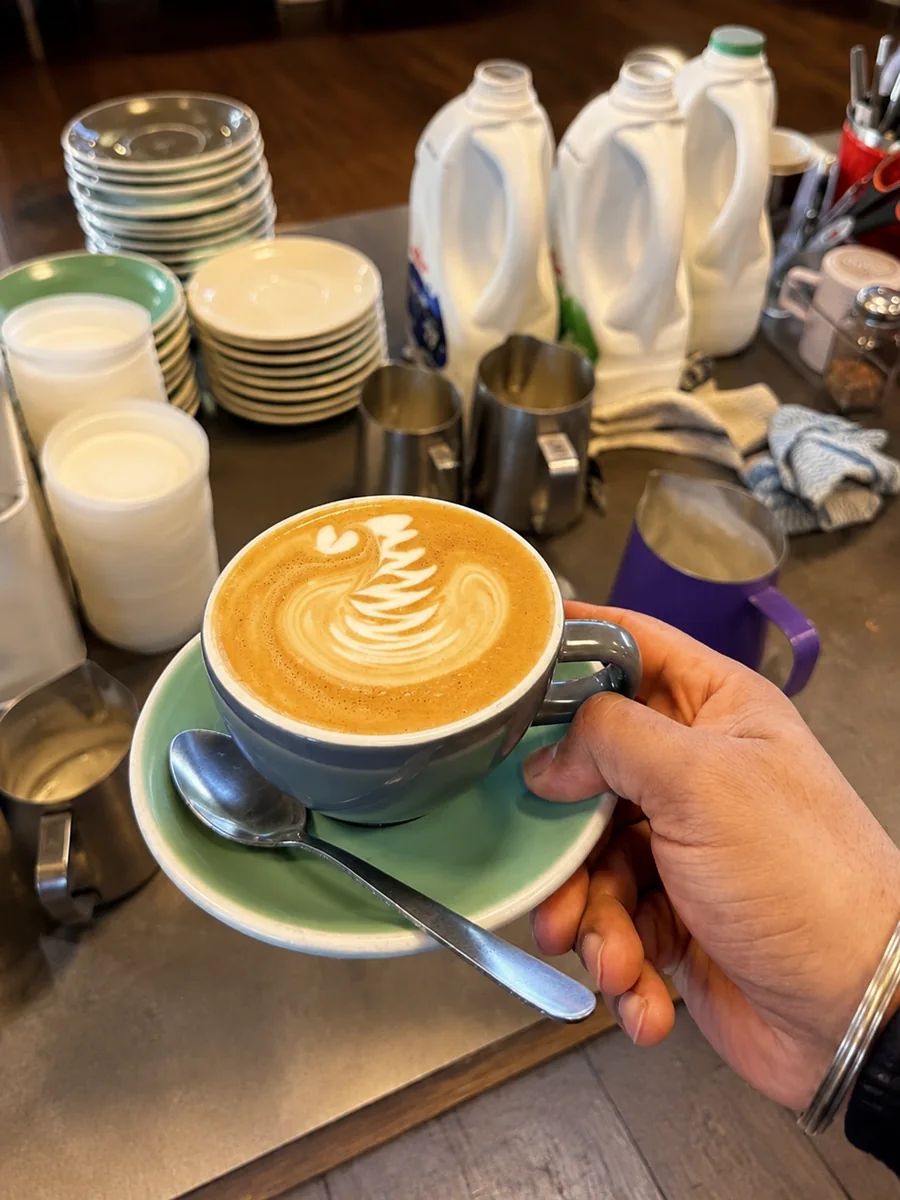 A latte prepared at the Nourish Cafe counter